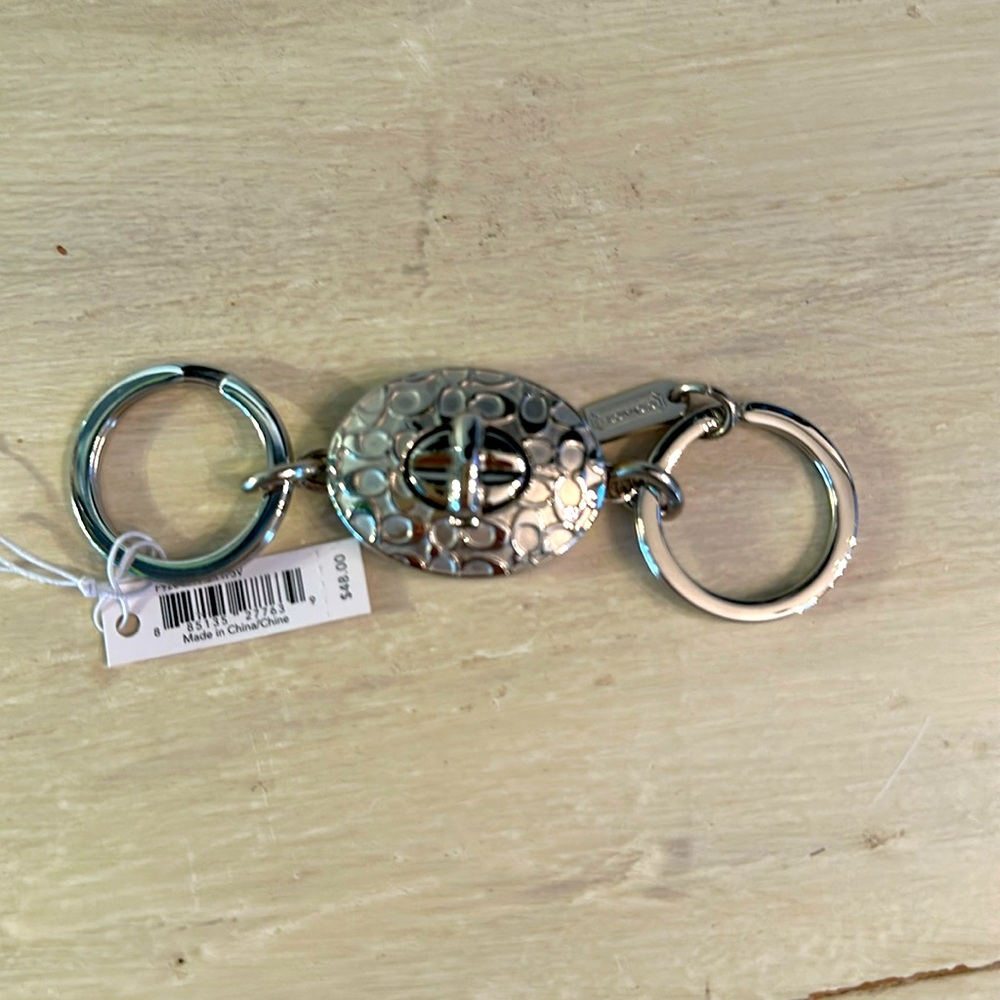 Coach silver vallet key chain